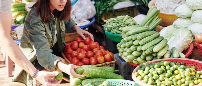 tourists at an open-air market
