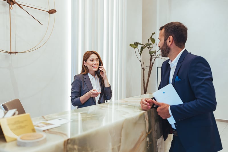Interaction between hotel employee and guest