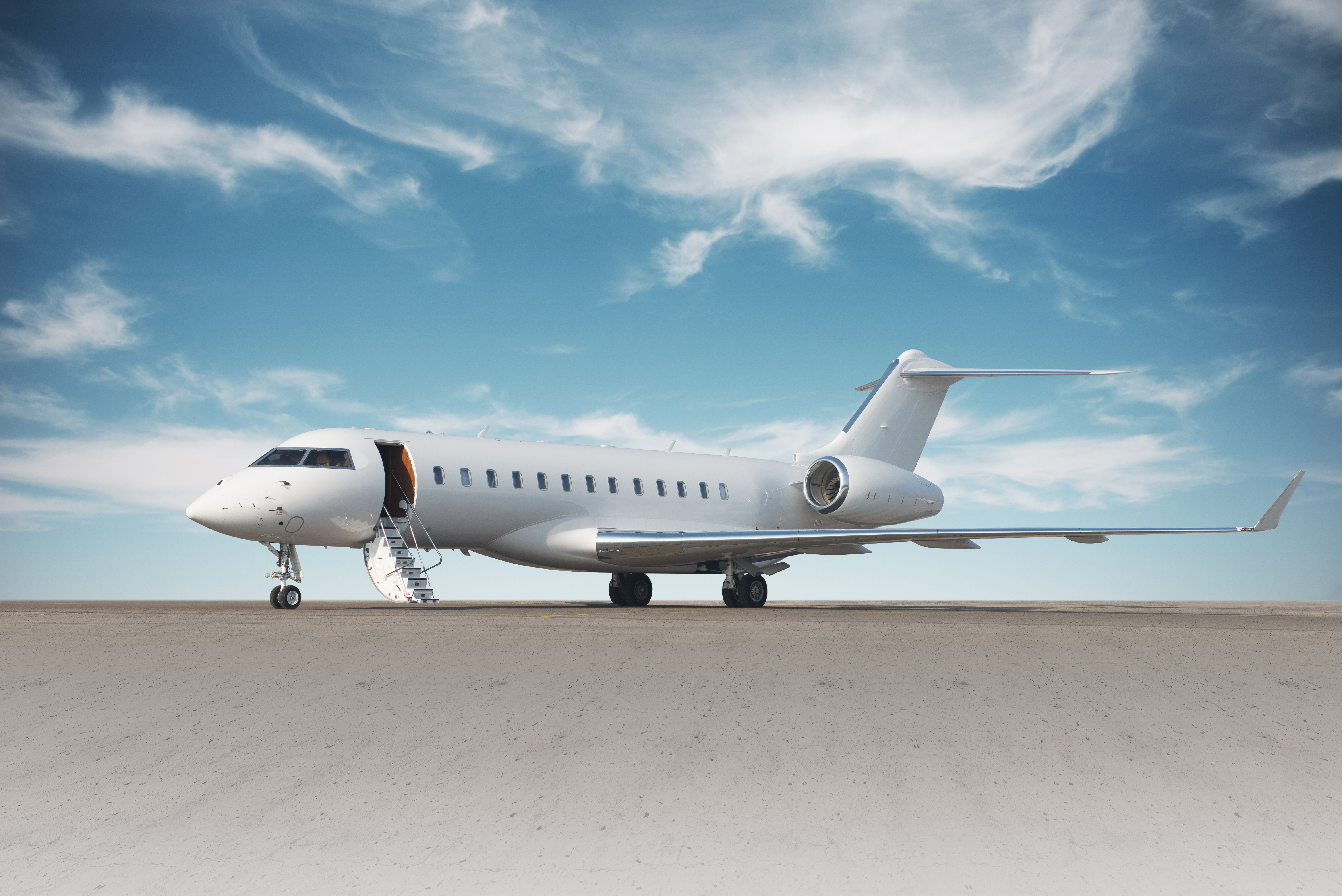 Private jet with blue sky