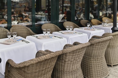 Set tables in front of a bistro