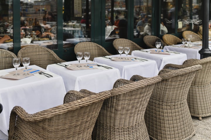 Set tables in front of a bistro