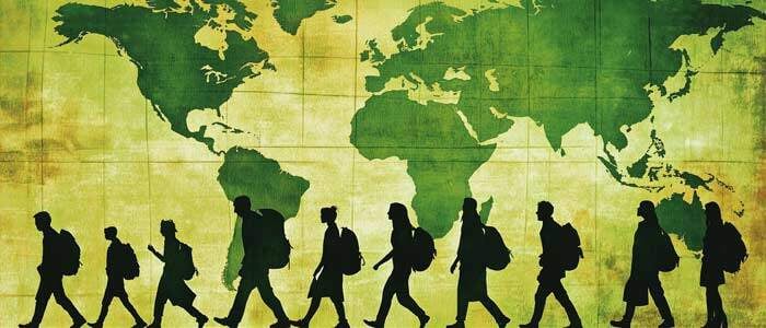 silouhettes of eco conscious travellers walking in front of world map