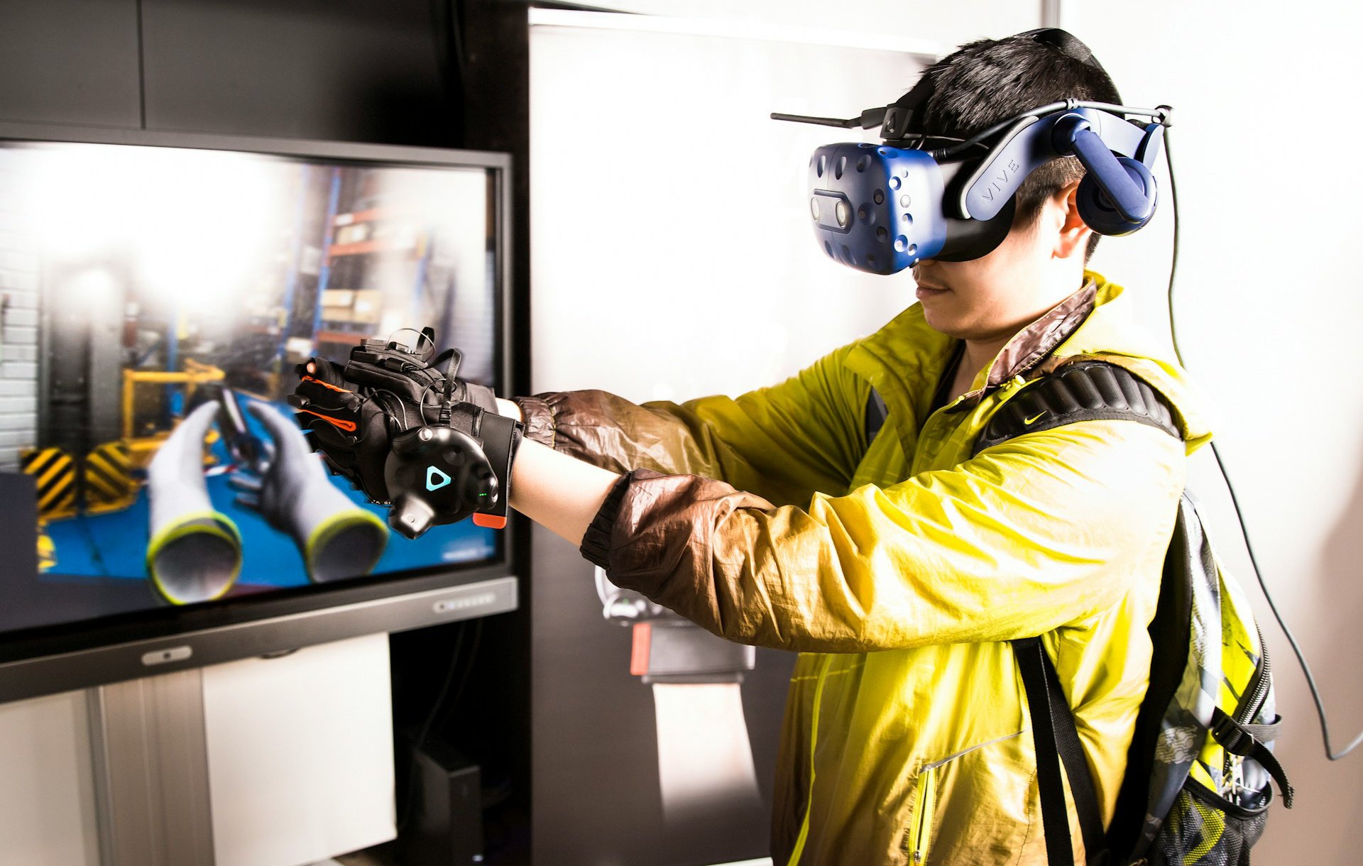 Person wearing haptics equipment