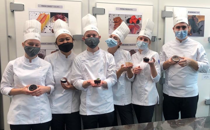 Photography of the EHL's students with lava cakes