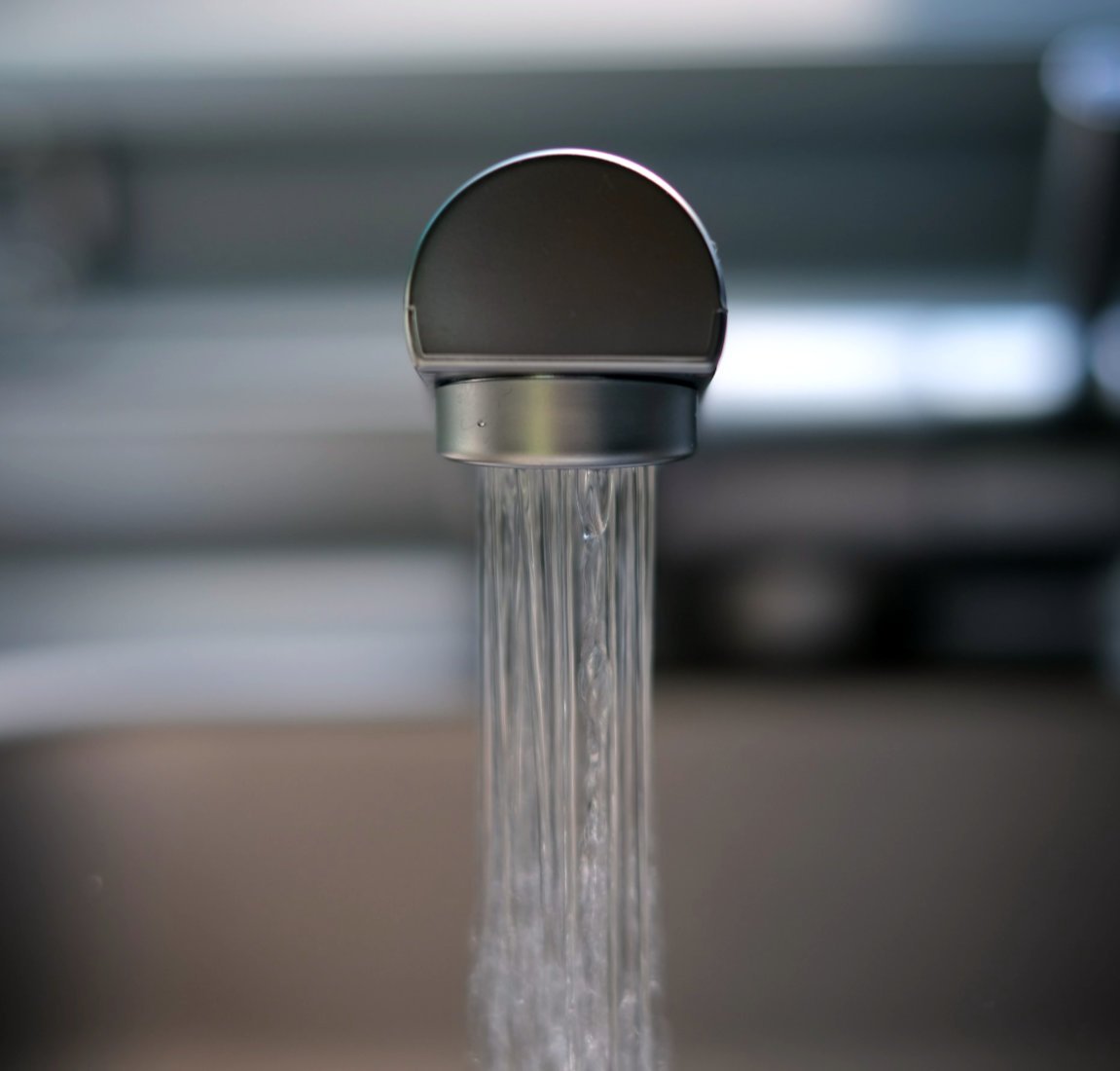 Low flow tap water conservation