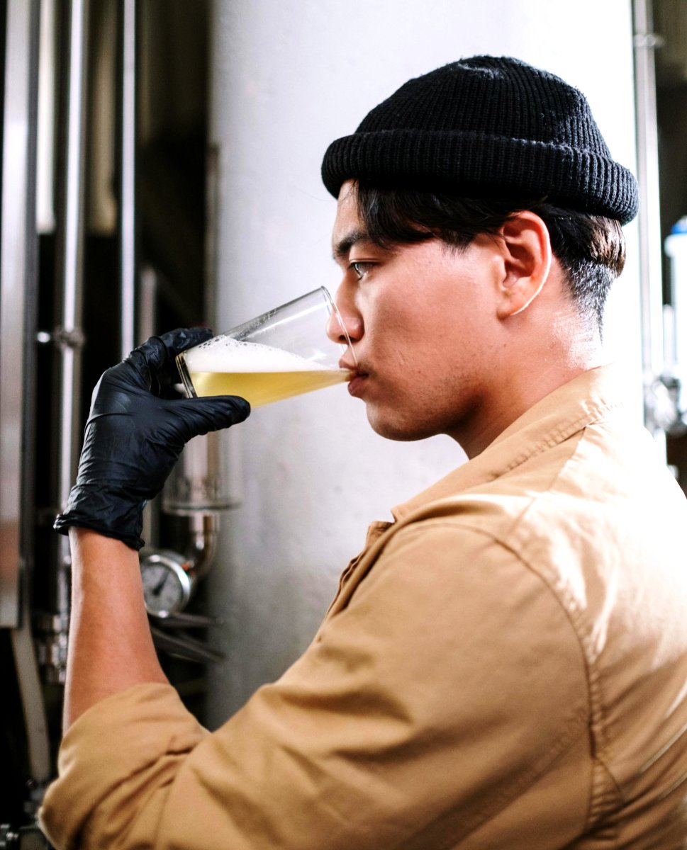 Person tasting beer