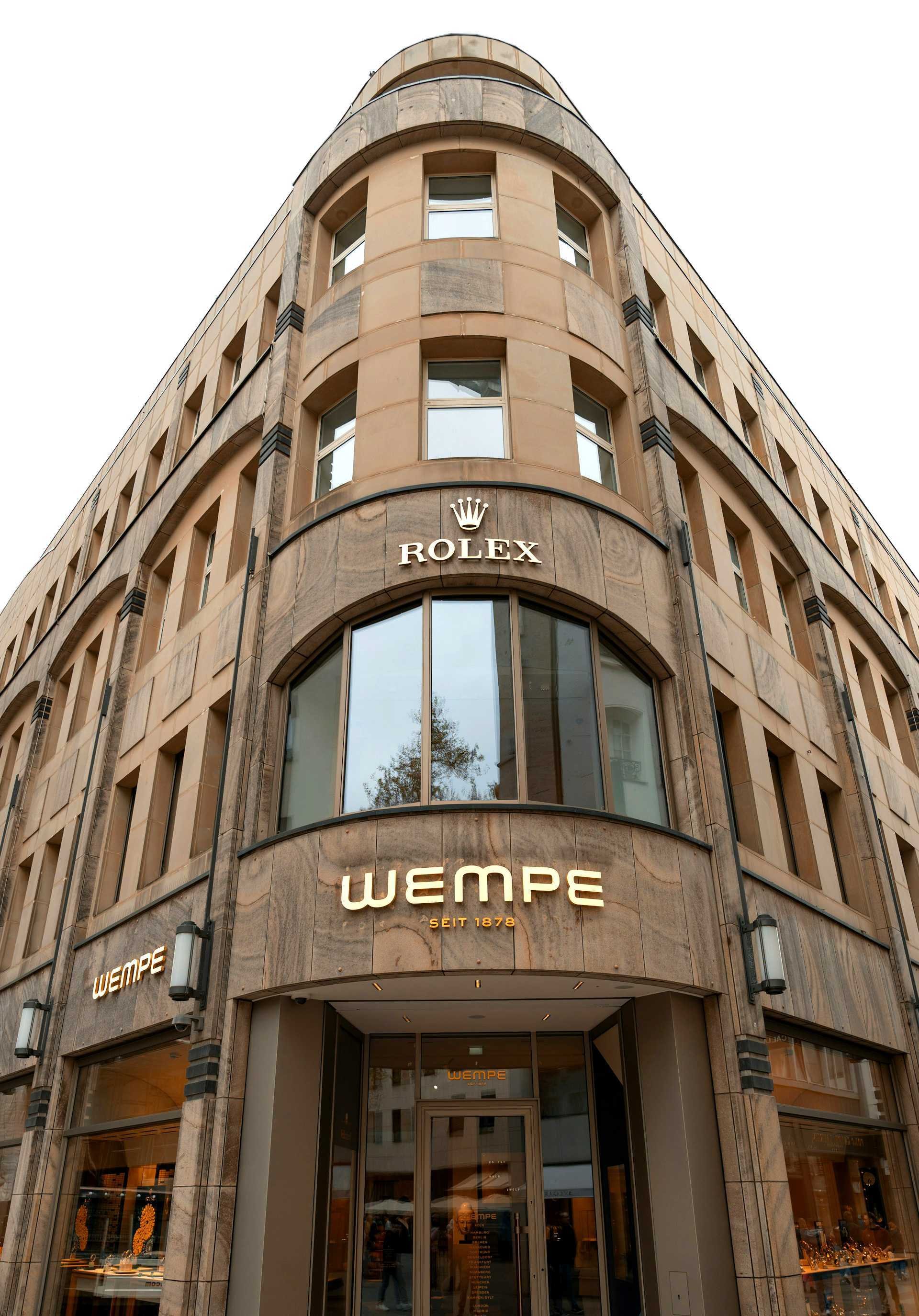 Rolex and Wempe outlets stacked at the corner of an old heritage building