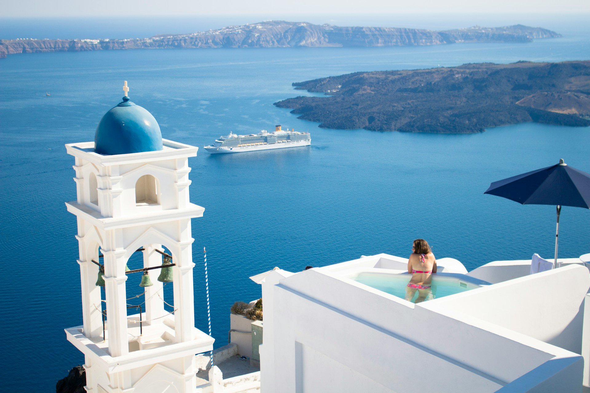 Rooftop pool looking over blue sea