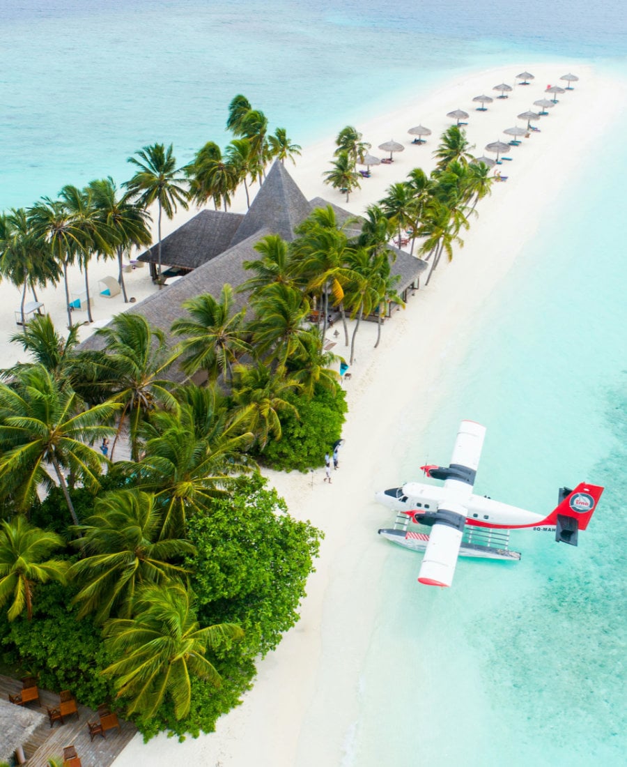 Seaplane docked at island resort