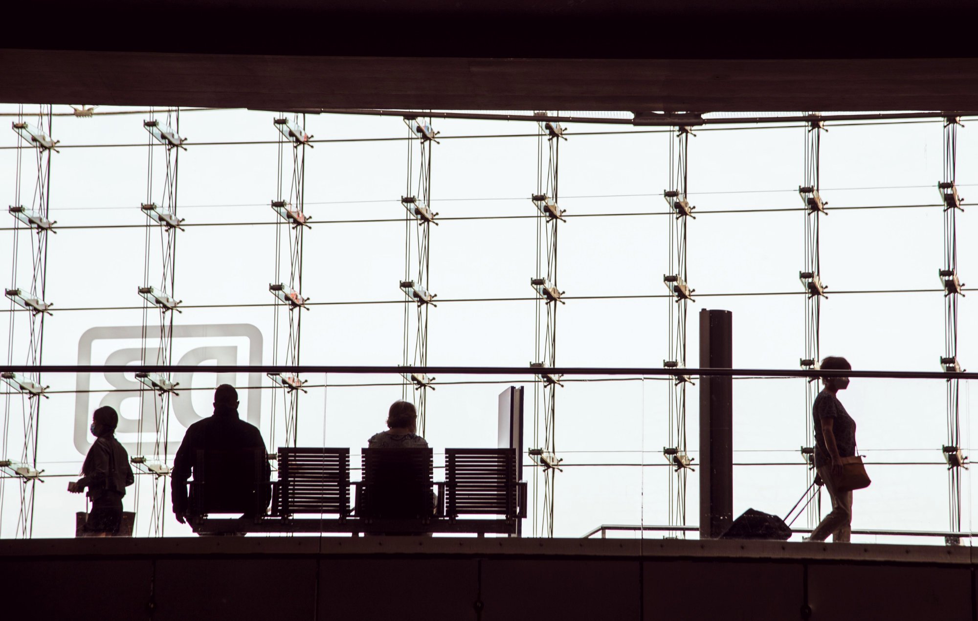 silhouettes-of-people-at-a-bank